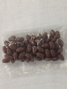 Photo of BROWN 6X8MM POLISHED PLASTIC BEAD 636BR
