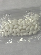 Photo of WHITE 6X8MM POLISHED PLASTIC BEAD 636W